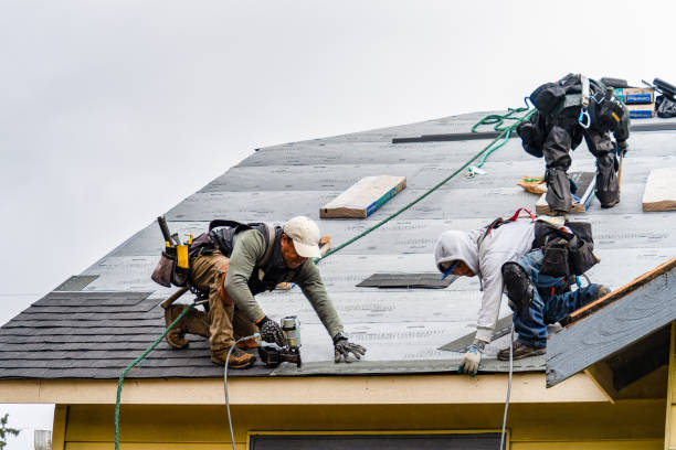 Professional Gutter Installation technician working in Smiths Station, AL